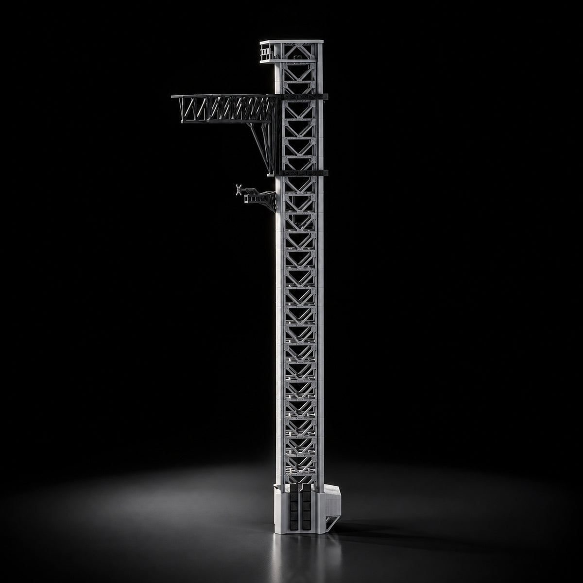 Starship launch tower scale model on a dark studio background