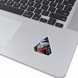 Artemis II mission badge vinyl sticker applied on a MacBook palm rest