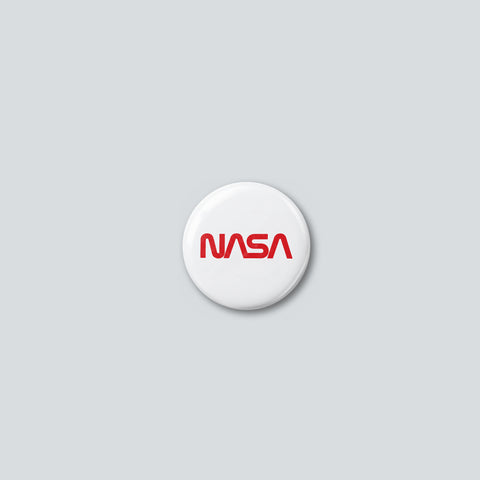 Round 25 mm pin with the red NASA worm logotype on a white face